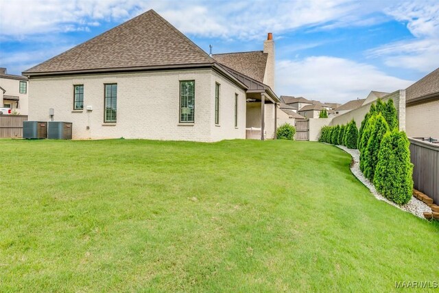 7175 Fain Park Loop, Montgomery, AL 36117 - rear view of property featuring a shingled roof and central AC unit
