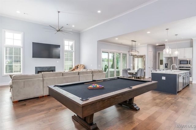 7175 Fain Park Loop, Montgomery, AL 36117 - playroom featuring ornamental molding, a fireplace, light wood-style flooring, pool table, and recessed lighting