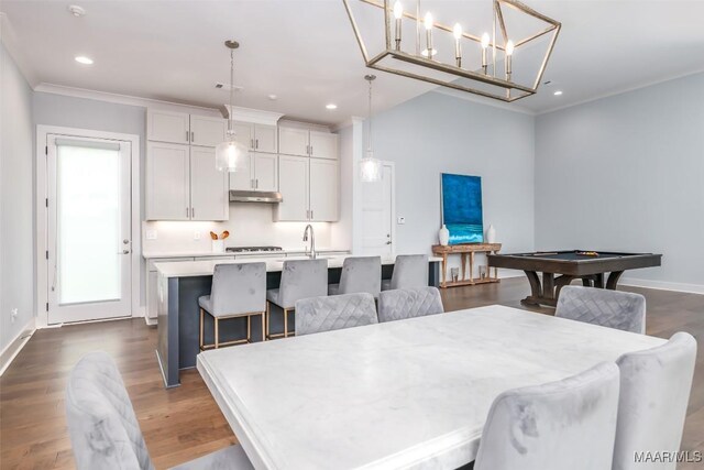 7175 Fain Park Loop, Montgomery, AL 36117 - dining room with billiards, crown molding, recessed lighting, dark wood-style flooring, and baseboards