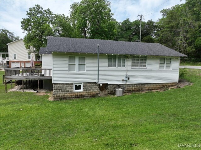 8099 County Road 59, Verbena, AL 36091 - back of property featuring a yard, a deck, and a shingled roof
