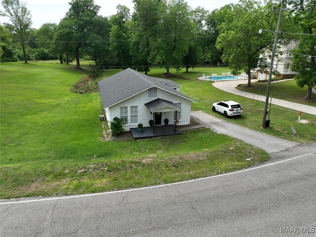 8099 County Road 59, Verbena, AL 36091 - view of front facade with asphalt driveway and a front yard