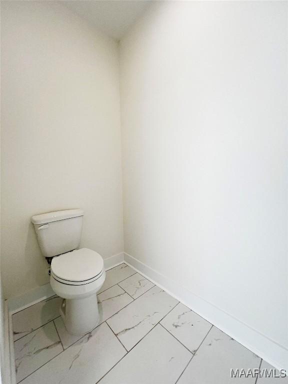 40 Serene Ln, Wetumpka, AL 36093 - bathroom with marble look tiles and baseboards