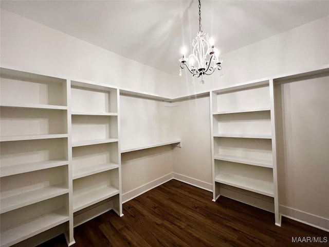 40 Serene Ln, Wetumpka, AL 36093 - spacious closet featuring a chandelier and dark wood-style floors