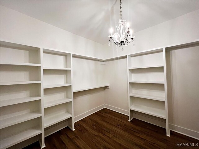 40 Serene Ln, Wetumpka, AL 36093 - walk in closet featuring a chandelier and dark wood-type flooring