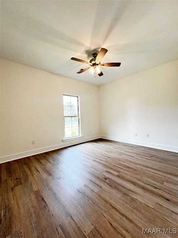 40 Serene Ln, Wetumpka, AL 36093 - spare room with dark wood-type flooring and ceiling fan