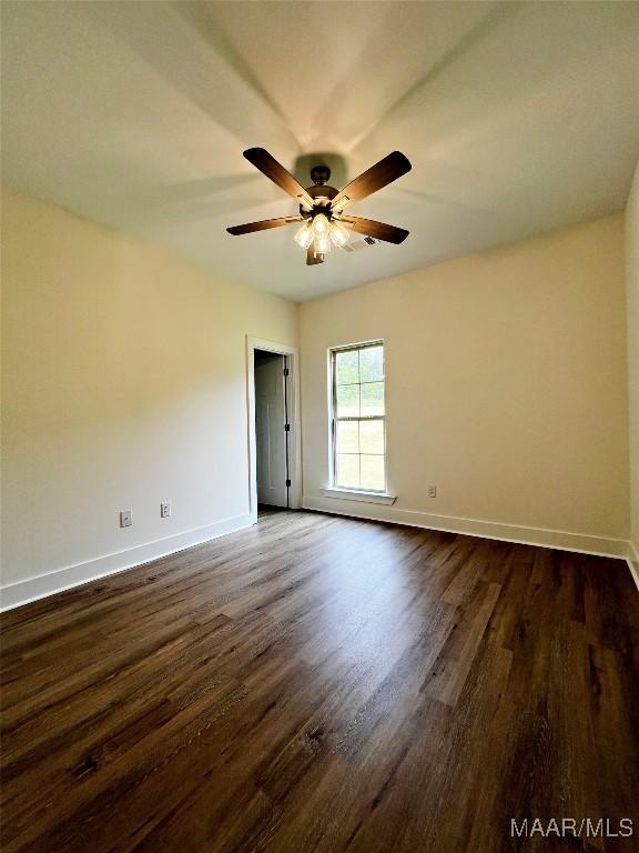 40 Serene Ln, Wetumpka, AL 36093 - empty room with dark wood-style flooring and a ceiling fan