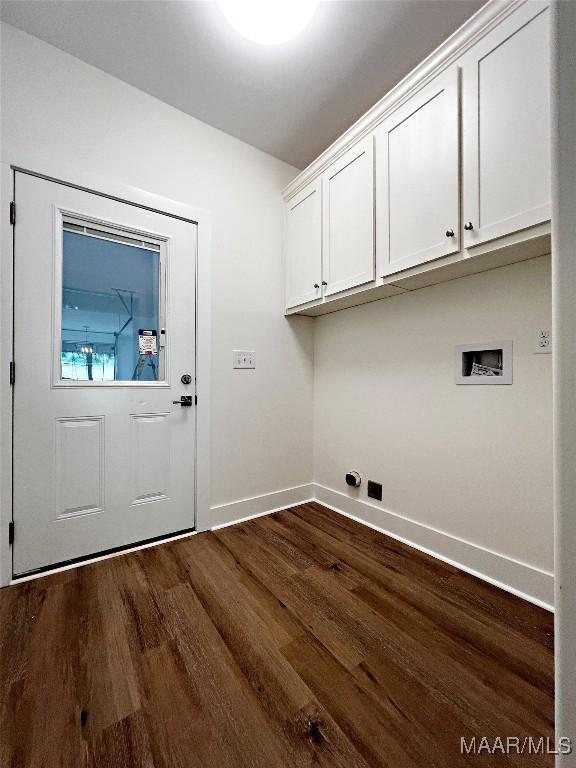 60 Serene Ln, Wetumpka, AL 36093 - laundry area with cabinet space, dark wood-style flooring, baseboards, and hookup for a washing machine