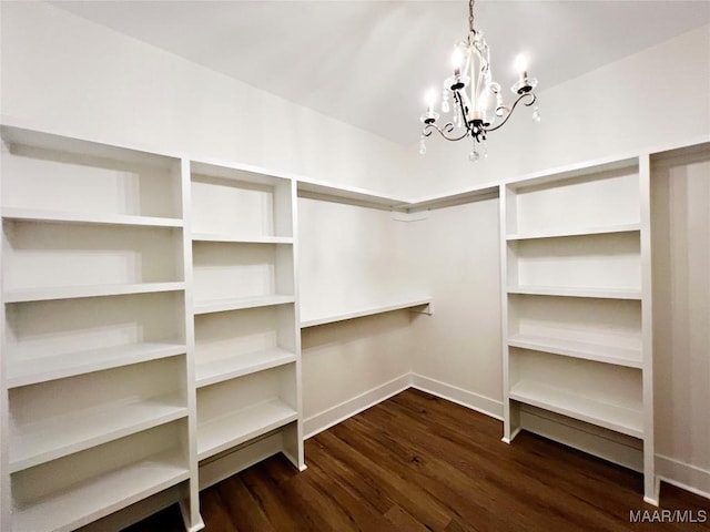 60 Serene Ln, Wetumpka, AL 36093 - walk in closet featuring a chandelier and dark wood-type flooring