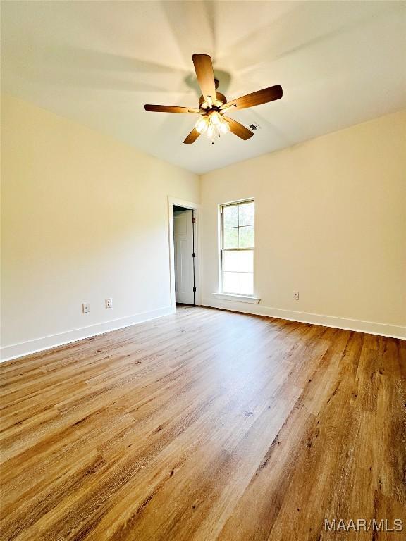 60 Serene Ln, Wetumpka, AL 36093 - unfurnished room with light wood-style flooring, baseboards, and a ceiling fan