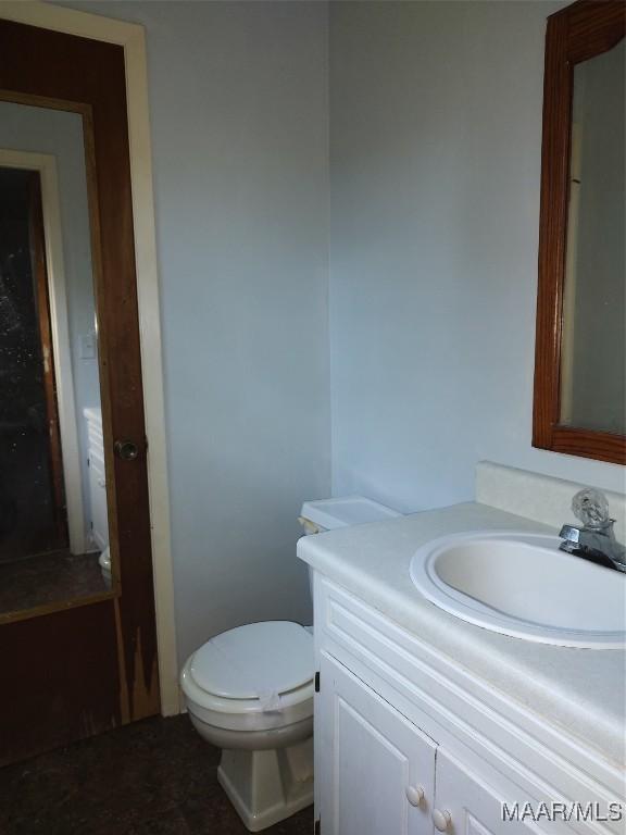 1018 Hillcrest Dr, Weaver, AL 36277 - half bath featuring vanity and toilet