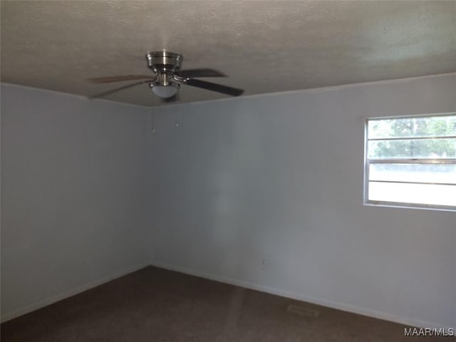 1018 Hillcrest Dr, Weaver, AL 36277 - empty room with a ceiling fan and baseboards