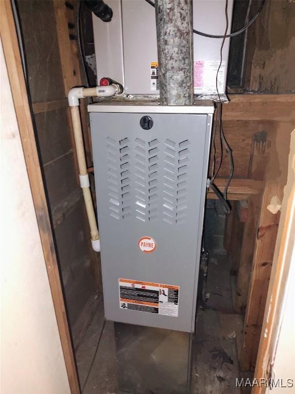 1018 Hillcrest Dr, Weaver, AL 36277 - utility room with heating unit