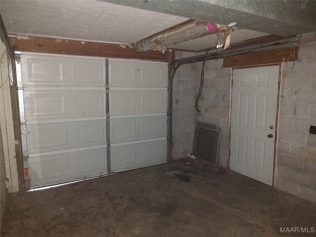 1018 Hillcrest Dr, Weaver, AL 36277 - garage featuring concrete block wall