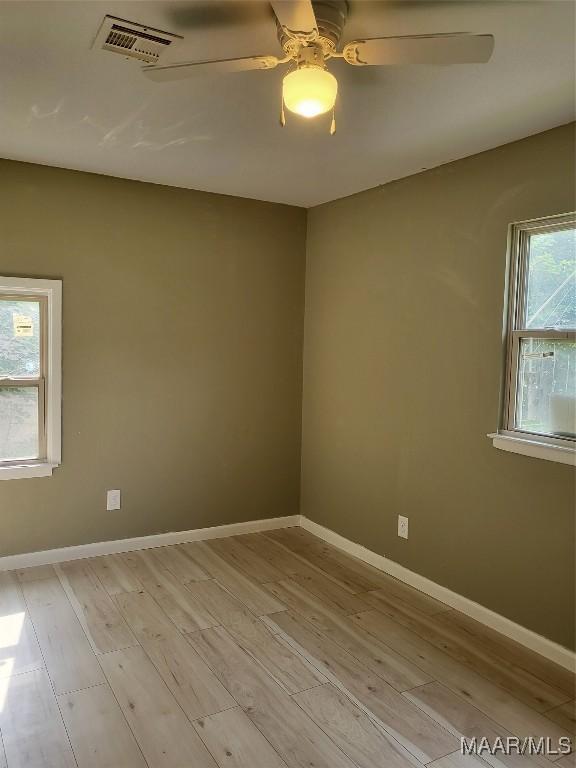439 Gardendale Dr, Montgomery, AL 36110 - spare room with light wood finished floors, baseboards, and a ceiling fan