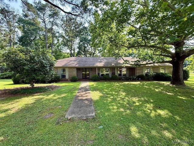 530 Palmquist Dr, Selma, AL 36701 - single story home featuring a front yard, brick siding, and french doors