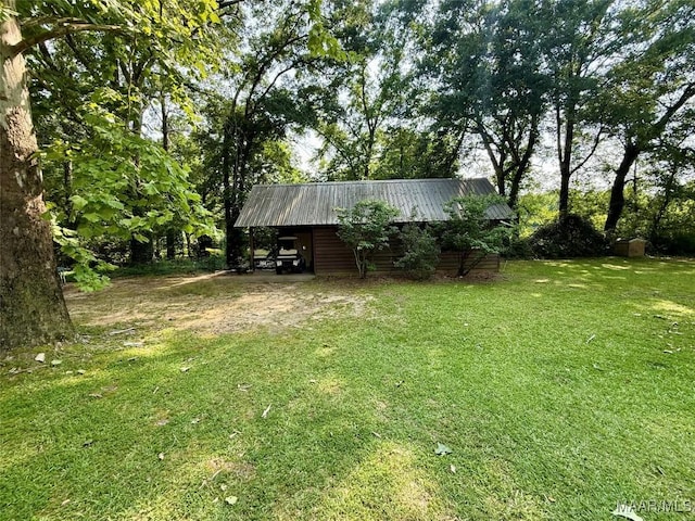 530 Palmquist Dr, Selma, AL 36701 - view of green lawn featuring an outbuilding