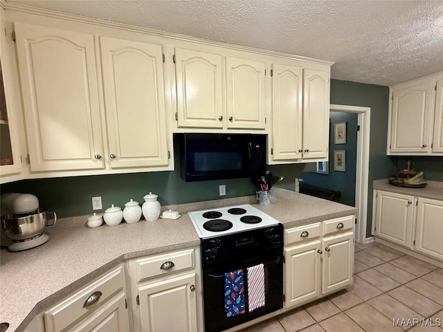 530 Palmquist Dr, Selma, AL 36701 - kitchen featuring black appliances, light countertops, light tile patterned flooring, a textured ceiling, and white cabinetry