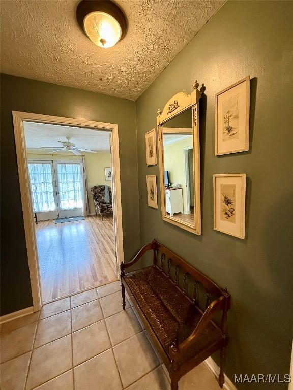 530 Palmquist Dr, Selma, AL 36701 - hall with a textured ceiling and light tile patterned floors