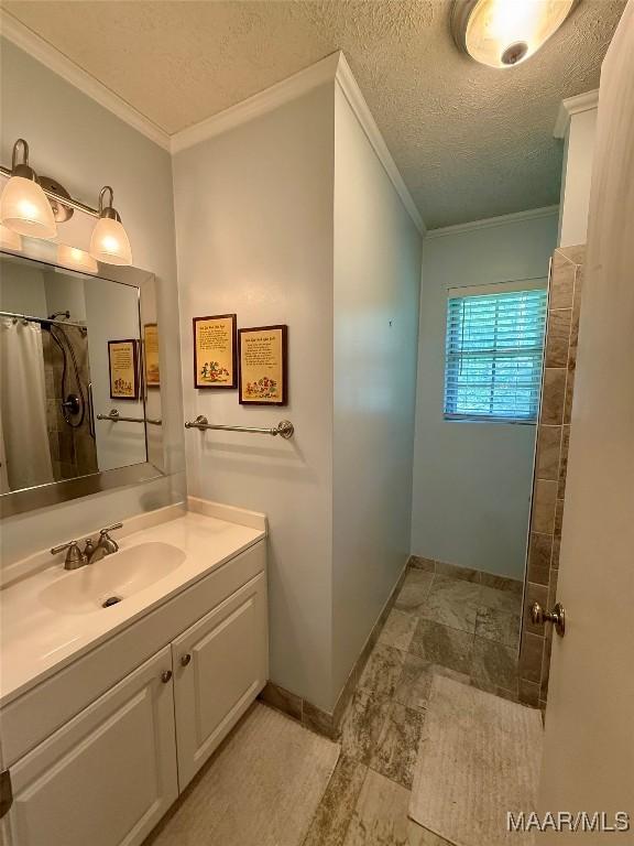 530 Palmquist Dr, Selma, AL 36701 - bathroom with crown molding, vanity, a shower with shower curtain, and a textured ceiling