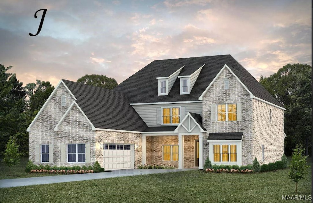1477 Tullahoma Dr, Prattville, AL 36066 - view of front facade with a front yard, an attached garage, and brick siding