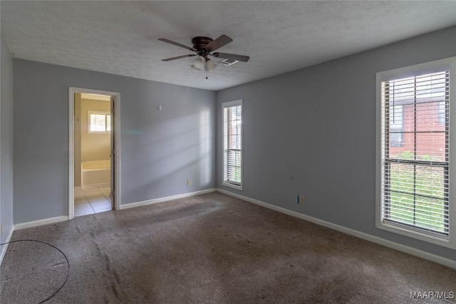 242 Preakness Path, Montgomery, AL 36117 - carpeted empty room featuring baseboards, ceiling fan, and a textured ceiling