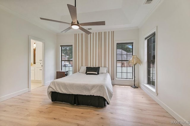 505 Mountain Ridge Rd, Millbrook, AL 36054 - bedroom with multiple windows, ornamental molding, wood finished floors, and baseboards