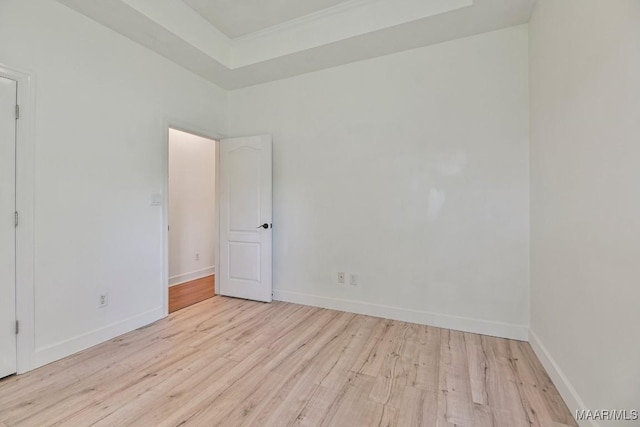 505 Mountain Ridge Rd, Millbrook, AL 36054 - unfurnished room with wood finished floors, baseboards, and a tray ceiling