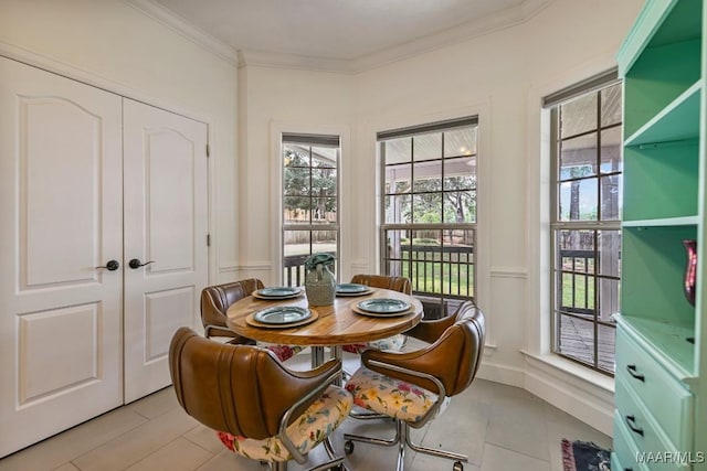 505 Mountain Ridge Rd, Millbrook, AL 36054 - dining space featuring healthy amount of natural light, crown molding, and light tile patterned flooring