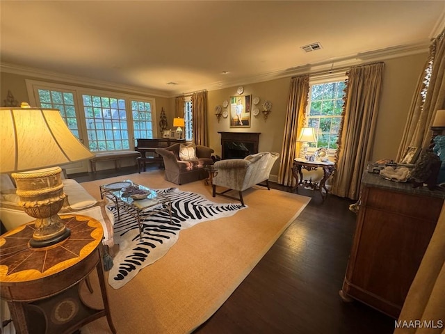 2081 Myrtlewood Dr, Montgomery, AL 36111 - living room with healthy amount of natural light, ornamental molding, dark wood-style floors, and a high end fireplace
