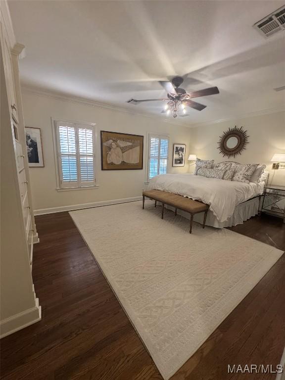 2081 Myrtlewood Dr, Montgomery, AL 36111 - bedroom with ornamental molding, dark wood-style floors, baseboards, and ceiling fan