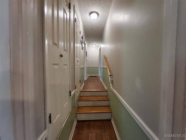 445 W Hickory Grove Rd, Lapine, AL 36046 - staircase with wood finished floors, baseboards, and a textured ceiling