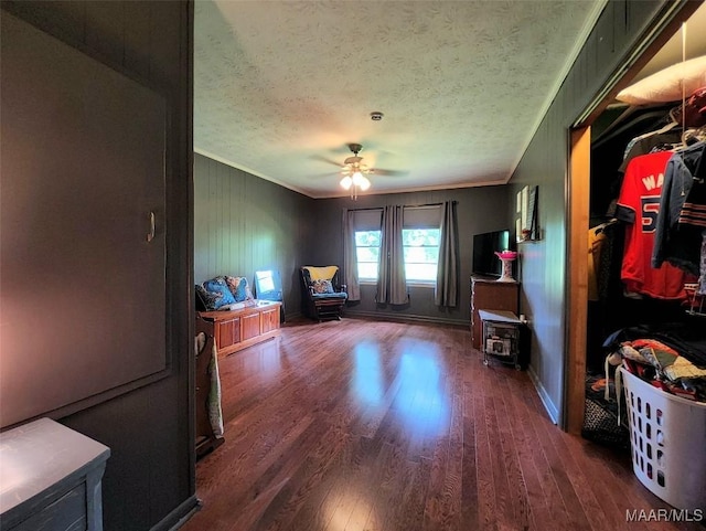 445 W Hickory Grove Rd, Lapine, AL 36046 - sitting room with ornamental molding, wood finished floors, a ceiling fan, a textured ceiling, and baseboards