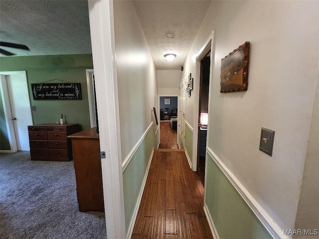 445 W Hickory Grove Rd, Lapine, AL 36046 - corridor with a textured ceiling, an upstairs landing, and wood finished floors