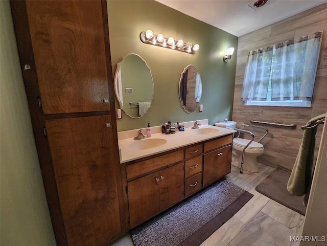 445 W Hickory Grove Rd, Lapine, AL 36046 - bathroom with double vanity, toilet, and tile walls