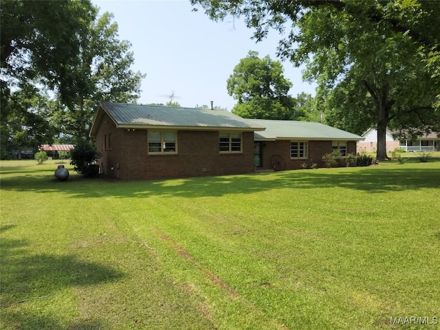 445 W Hickory Grove Rd, Lapine, AL 36046 - rear view of house featuring a yard and brick siding