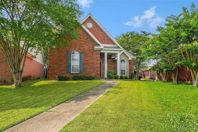 2604 Shep Ct, Montgomery, AL 36117 - view of front facade with a front lawn and brick siding