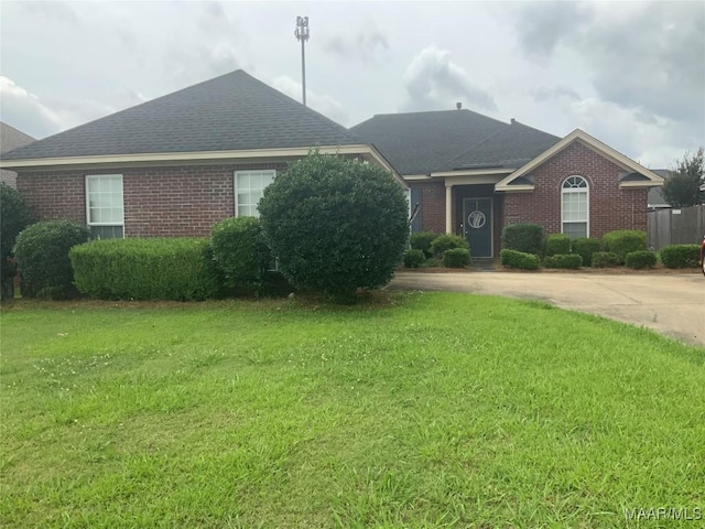 2320 Halcyon Downs Loop, Montgomery, AL 36117 - single story home with brick siding, a front yard, and roof with shingles