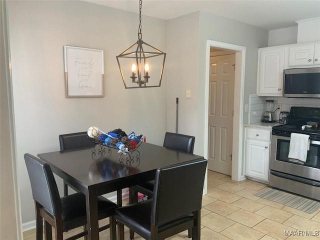 2320 Halcyon Downs Loop, Montgomery, AL 36117 - dining space with a chandelier and light tile patterned flooring