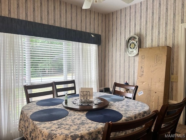 1915 Emerald Mountain Pkwy, Wetumpka, AL 36093 - dining area with wallpapered walls, healthy amount of natural light, and a ceiling fan