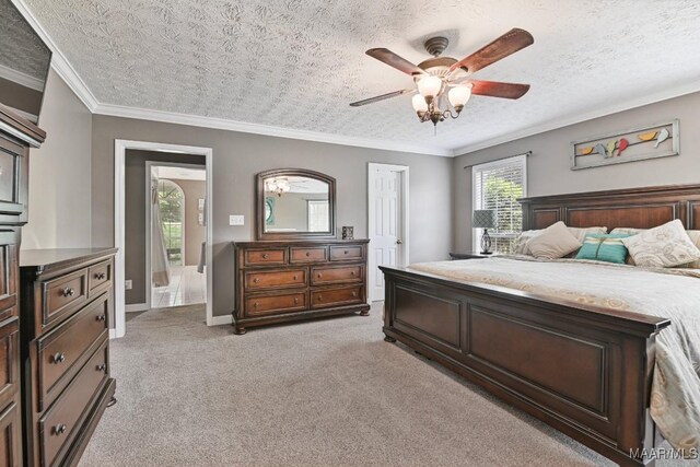 594 Lewis Rd, Deatsville, AL 36022 - bedroom with light carpet, ornamental molding, a ceiling fan, and baseboards
