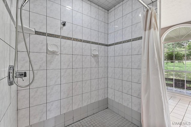 594 Lewis Rd, Deatsville, AL 36022 - bathroom featuring a stall shower and tile patterned floors