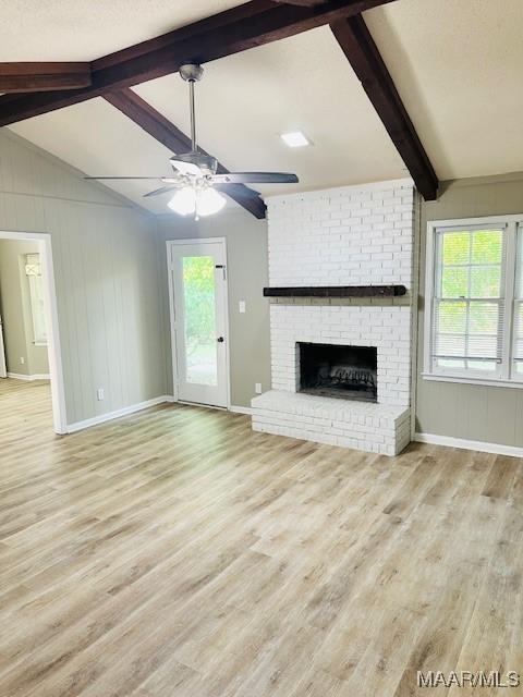 6118 Helga Pl, Montgomery, AL 36117 - unfurnished living room featuring wood finished floors, a fireplace, baseboards, and ceiling fan