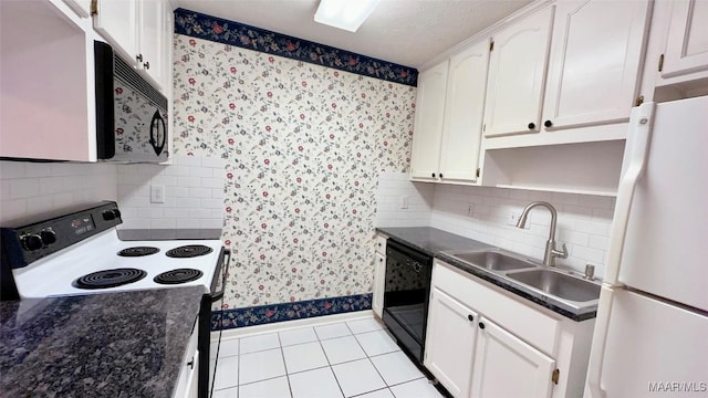 6616 Chaprice Ln, Montgomery, AL 36117 - kitchen with black appliances, a sink, white cabinetry, dark countertops, and light tile patterned floors