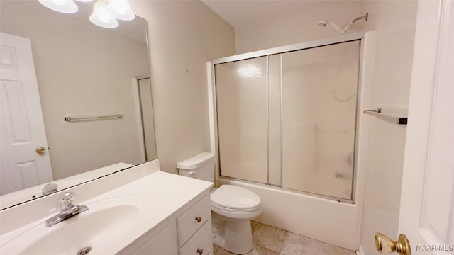 6616 Chaprice Ln, Montgomery, AL 36117 - bathroom with vanity, toilet, combined bath / shower with glass door, and tile patterned flooring