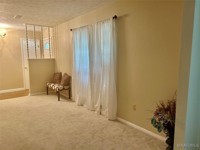 108 Shawnee Dr, Wetumpka, AL 36092 - unfurnished room featuring carpet flooring, a textured ceiling, and baseboards