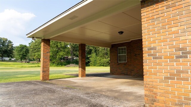 22 Daleview Cir, Sylacauga, AL 35150 - view of patio with a carport