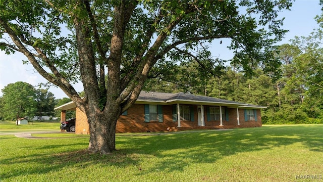 22 Daleview Cir, Sylacauga, AL 35150 - ranch-style home with a front lawn and brick siding
