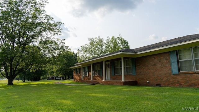22 Daleview Cir, Sylacauga, AL 35150 - view of side of property featuring a yard and brick siding