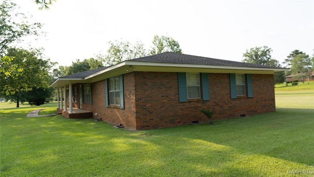 22 Daleview Cir, Sylacauga, AL 35150 - view of side of property with crawl space, a lawn, and brick siding
