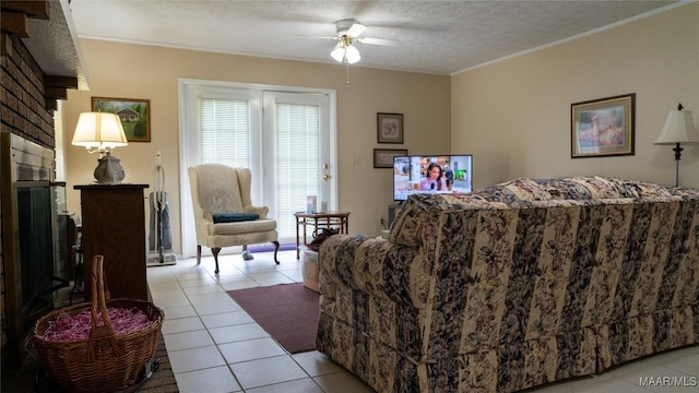 22 Daleview Cir, Sylacauga, AL 35150 - living room with light tile patterned flooring, a ceiling fan, ornamental molding, and a textured ceiling